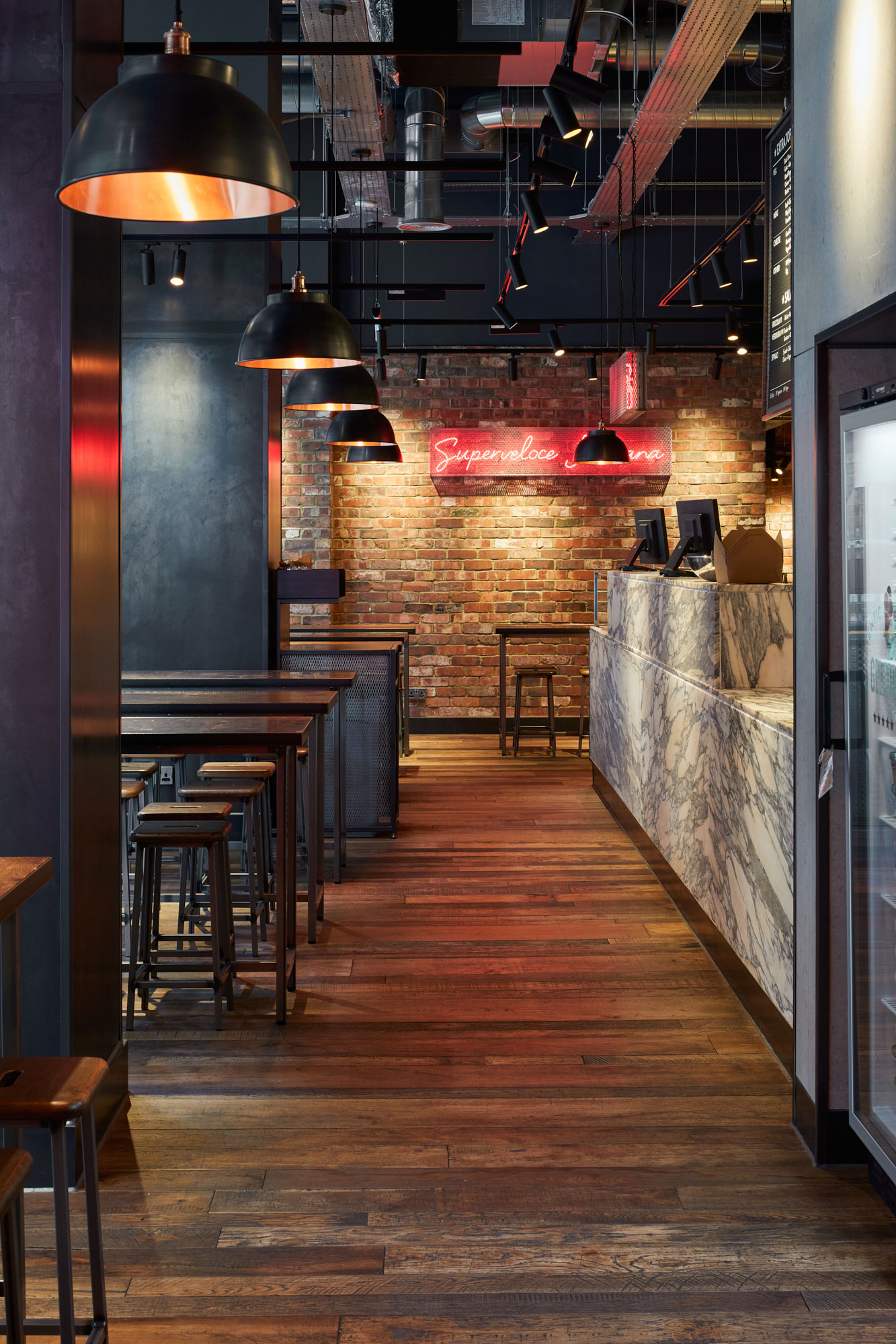 Reclaimed Barn Oak Flooring by The Main Company for Pizza Union