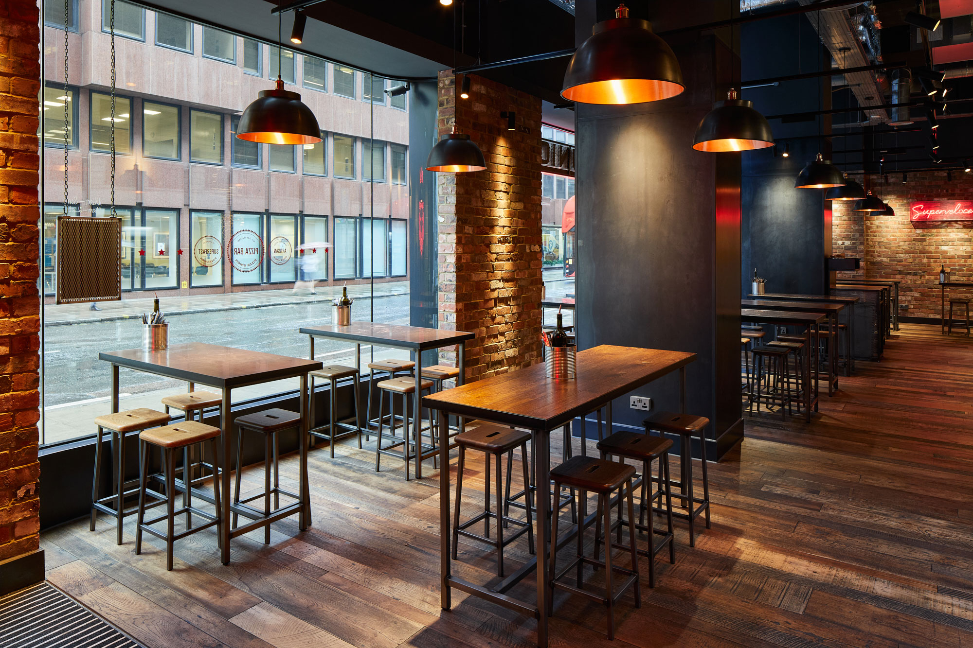 Reclaimed wood floor boards in Pizza Union