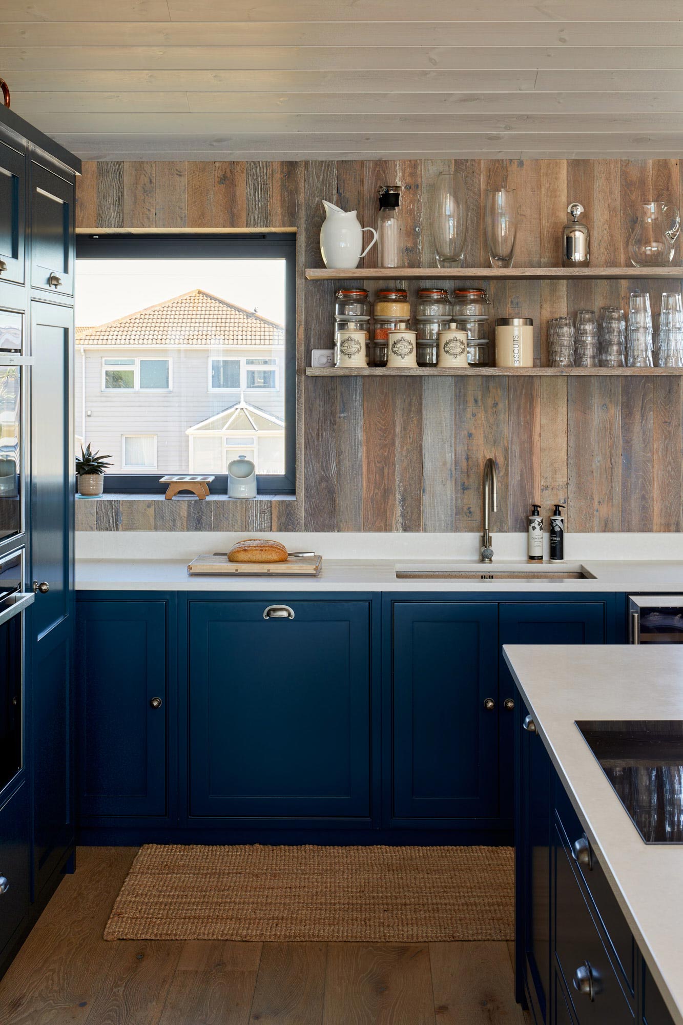 Reclaimed barn oak cladding in kitchen