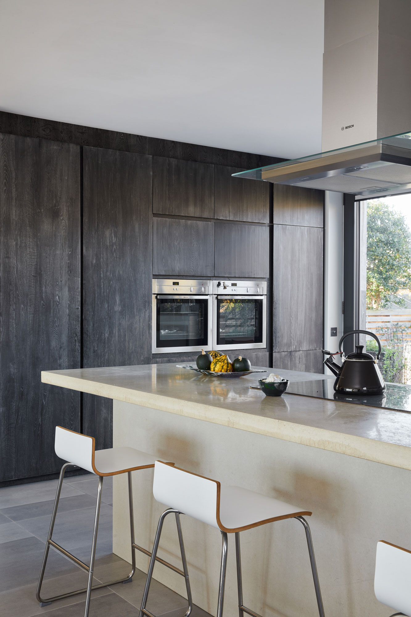 Reclaimed black oak tall kitchen cabinets