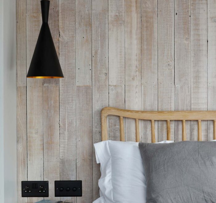 reclaimed wood cladding in bedroom