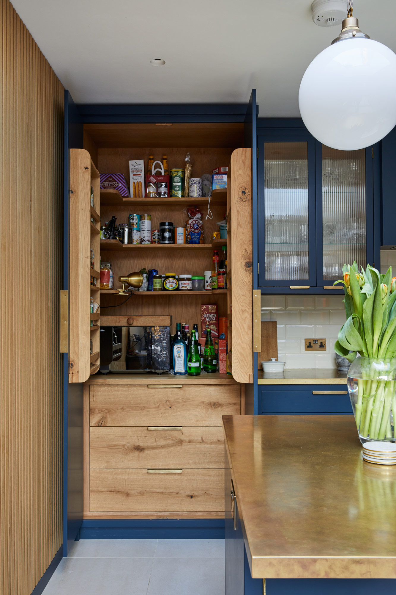 Custom built integrated kitchen larder