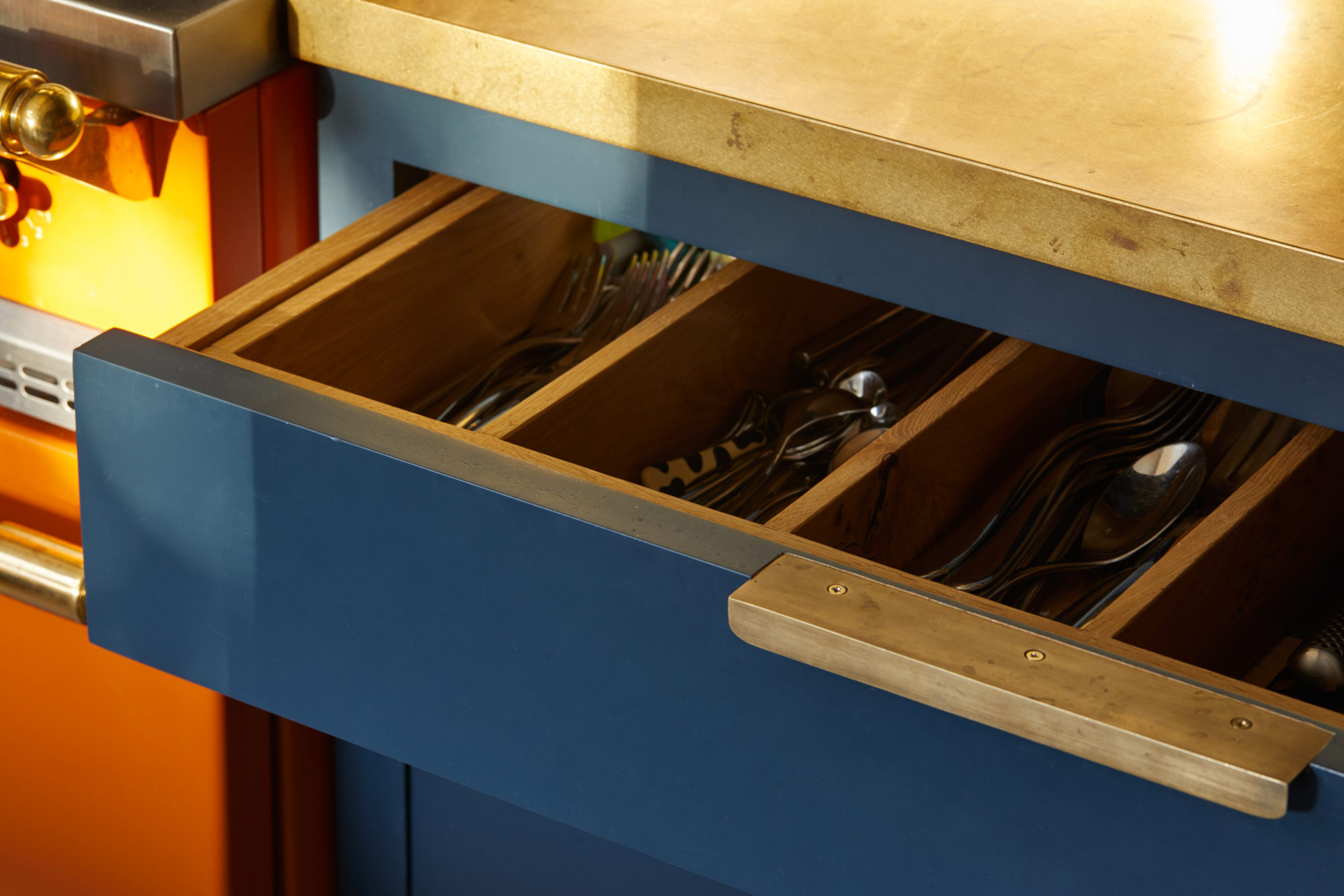 Bespoke oak inserts inside The Main Company drawer stack