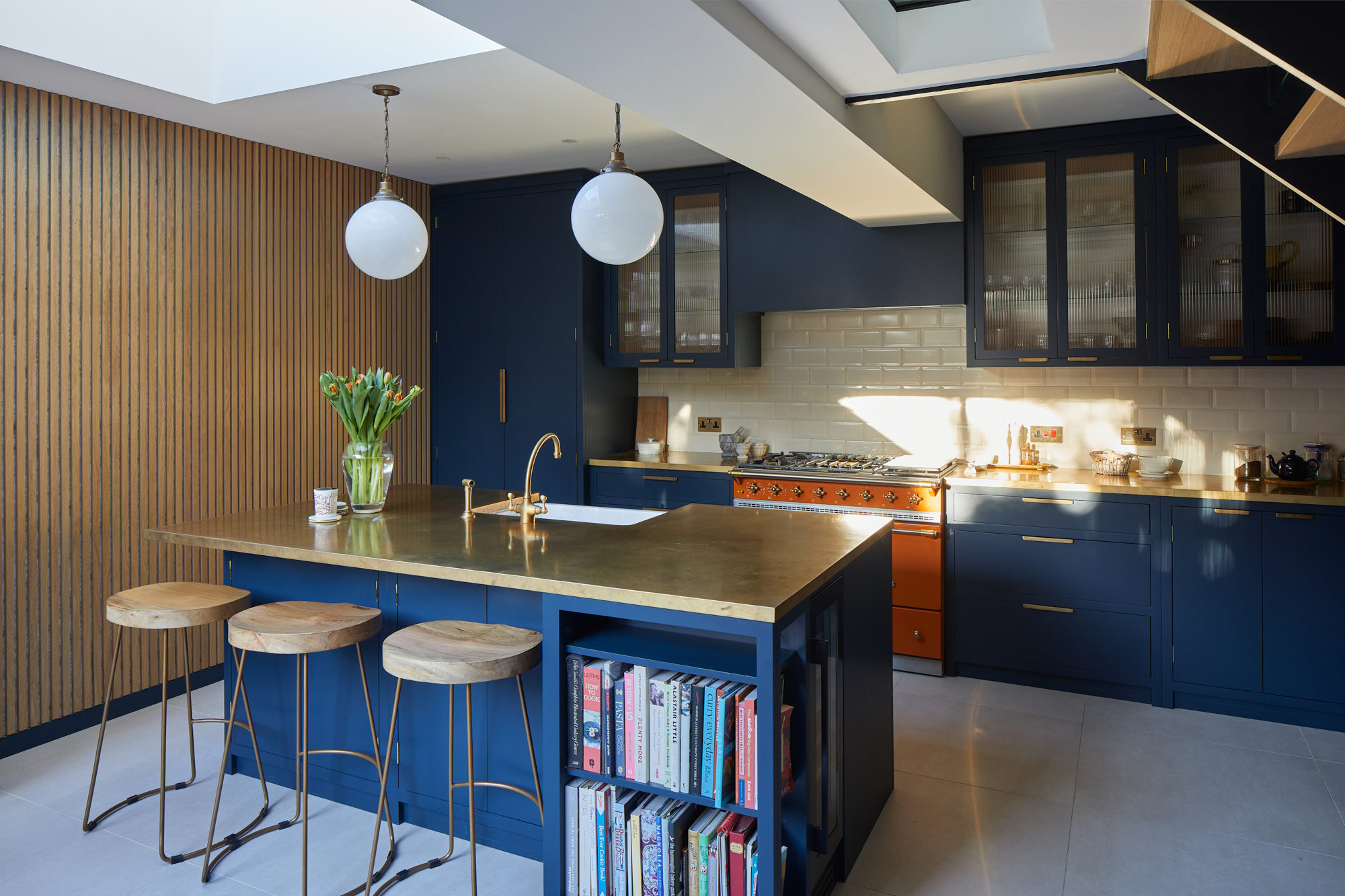 Clean oak painted blue kitchen in London