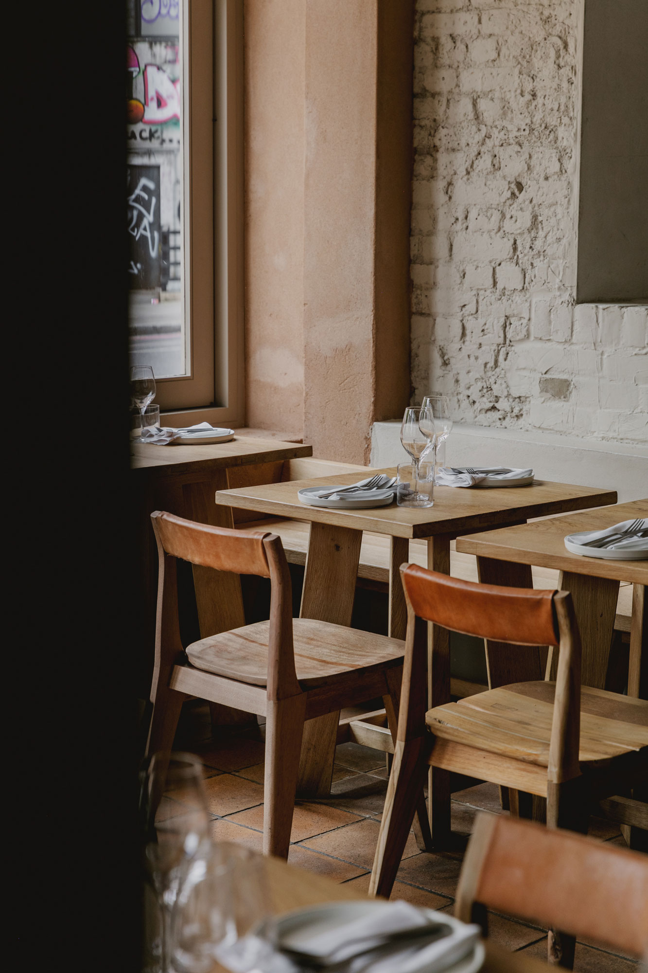 Dining table and chairs in cozy London restaurant