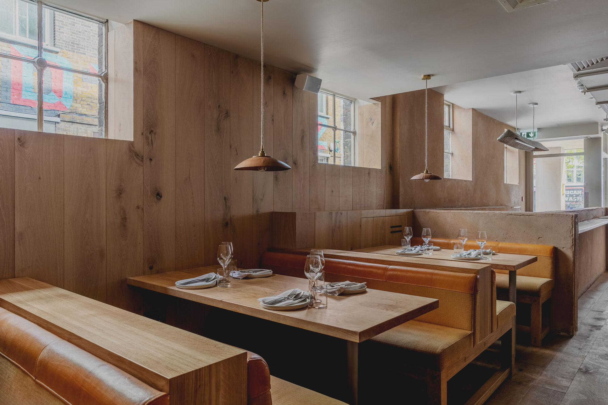 Oak cladded walls in popular London restaurant