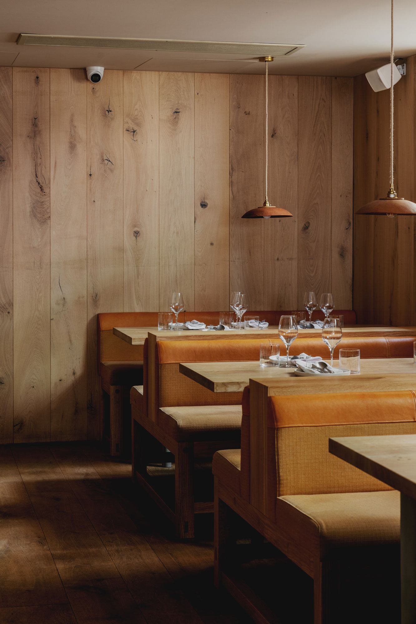 Oak cladded wall in commercial restaurant