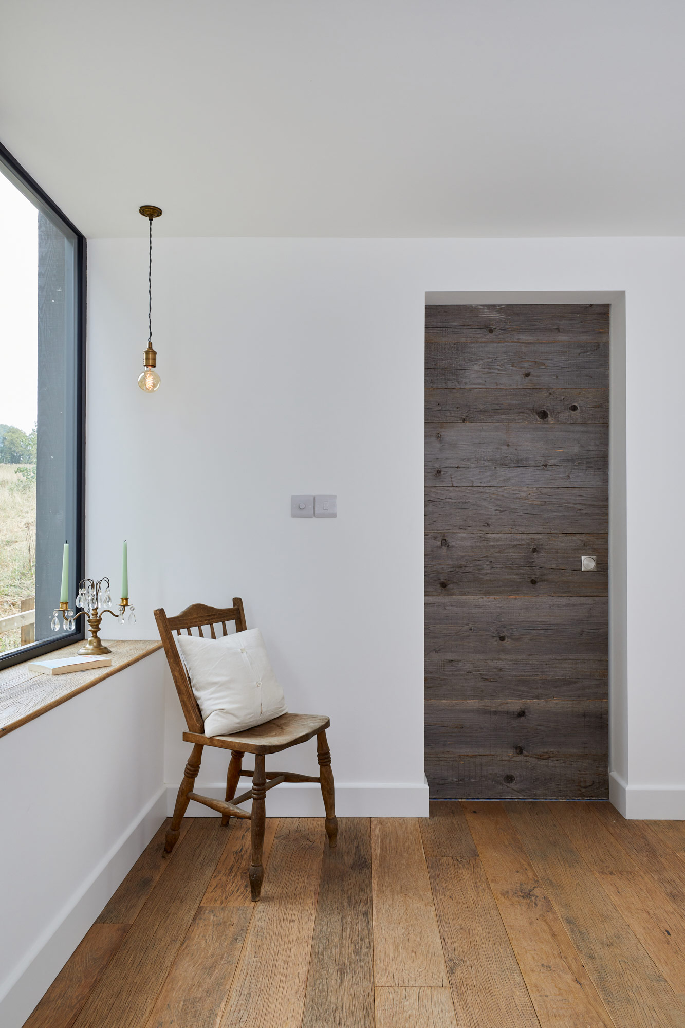 Sliding barn door with reclaimed timber face