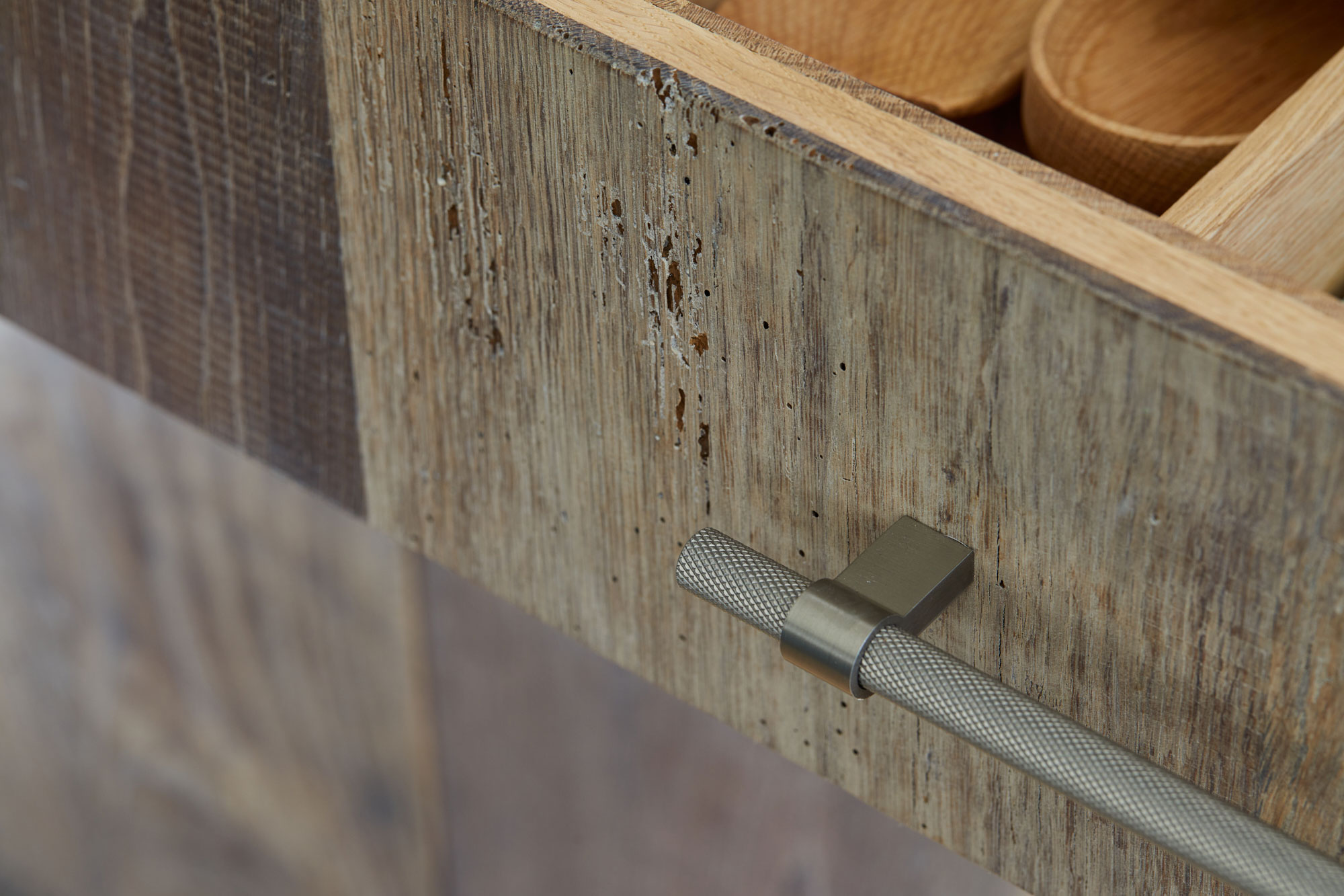 Kitchen drawer fronts made from reclaimed engineered oak