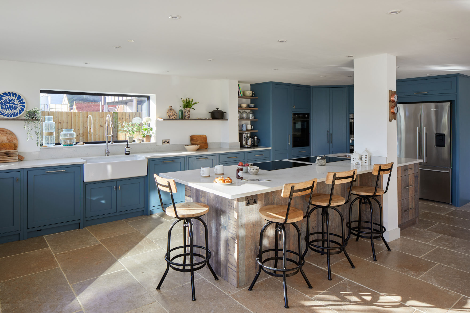 Large rustic open plan kitchen island crafted by The Main Company in York