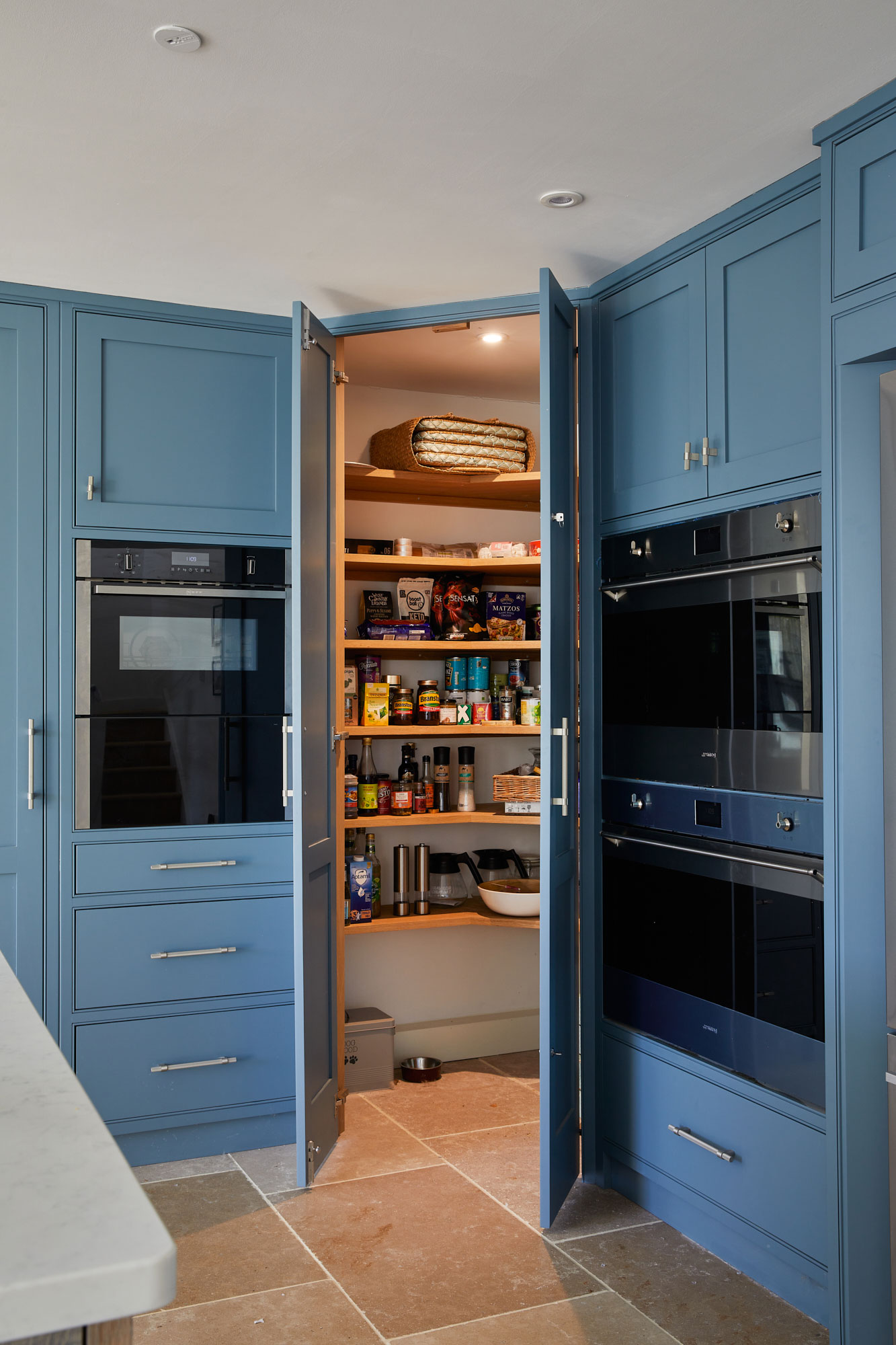 Tall corner larder design fully fitted