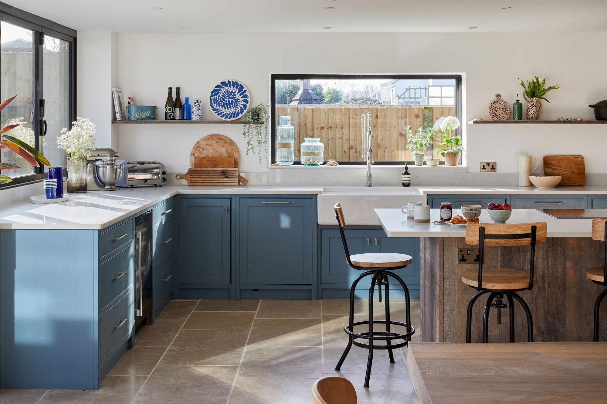 Teal blue green painted kitchen cabinets