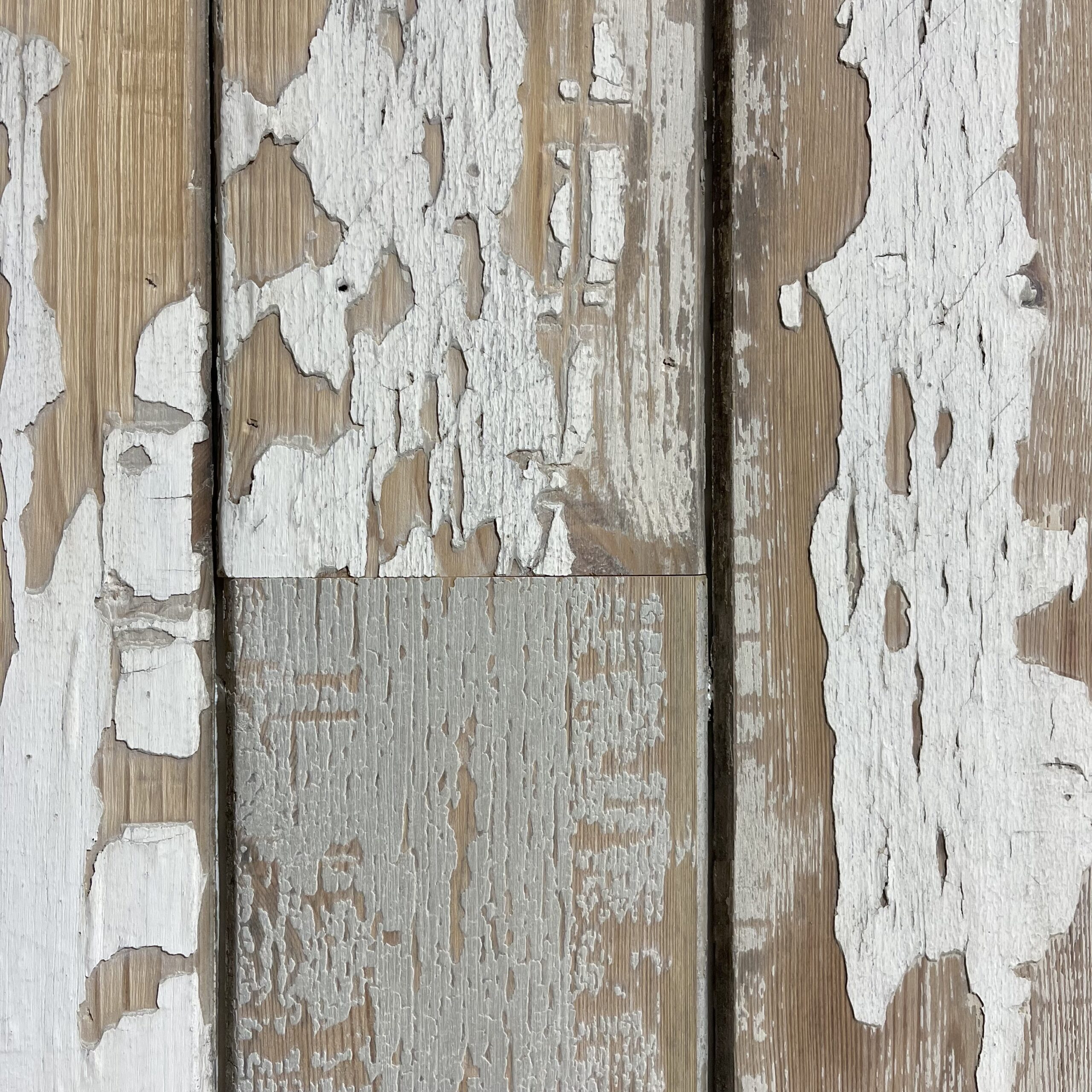 Crackled white painted cladding