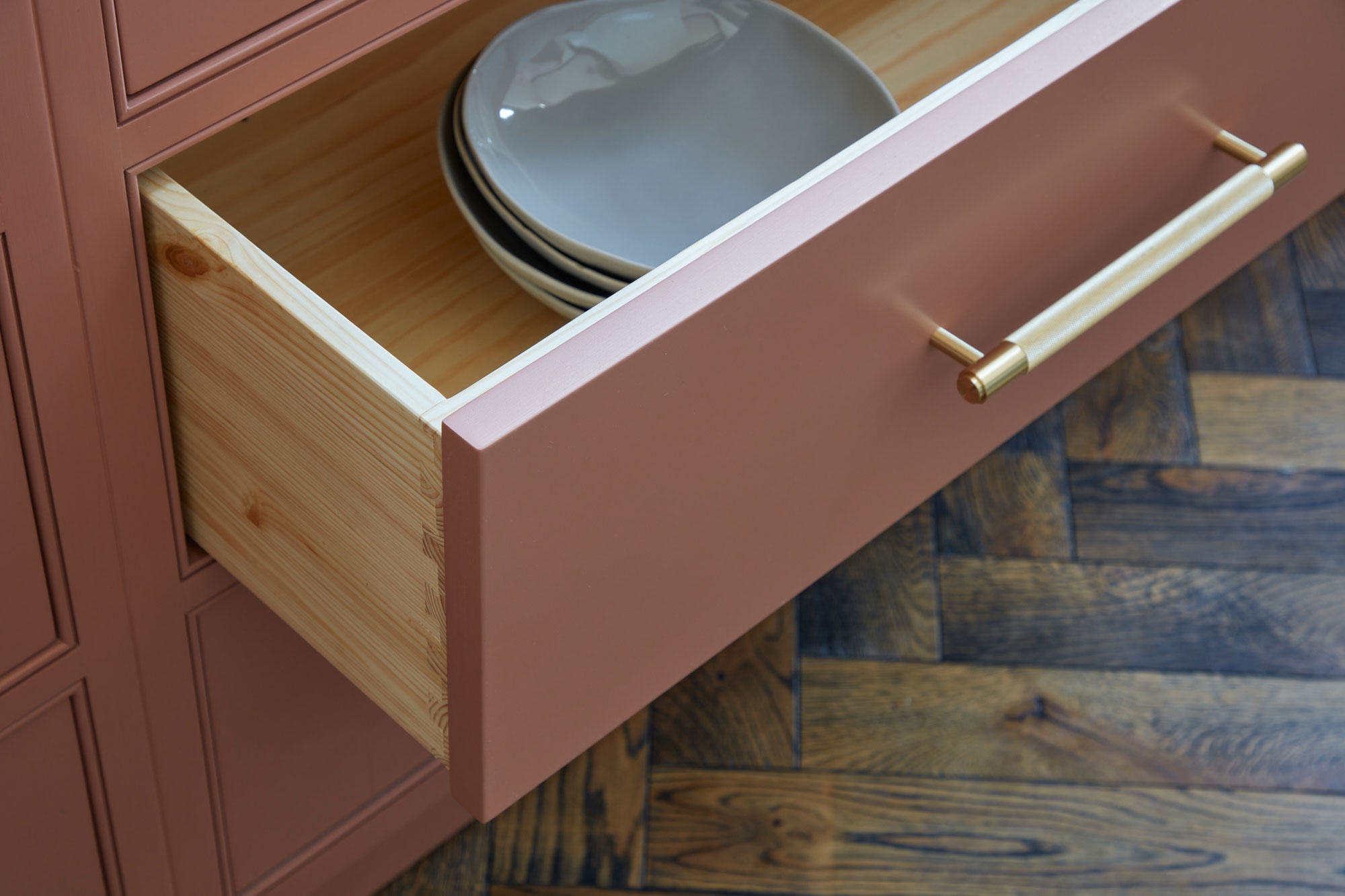 Deep pink pan drawer with solid redwood interior