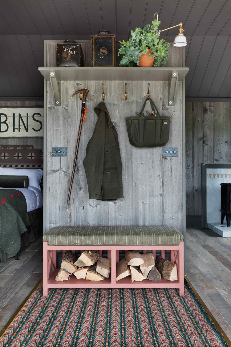 Rustic log cabin with firewood storage