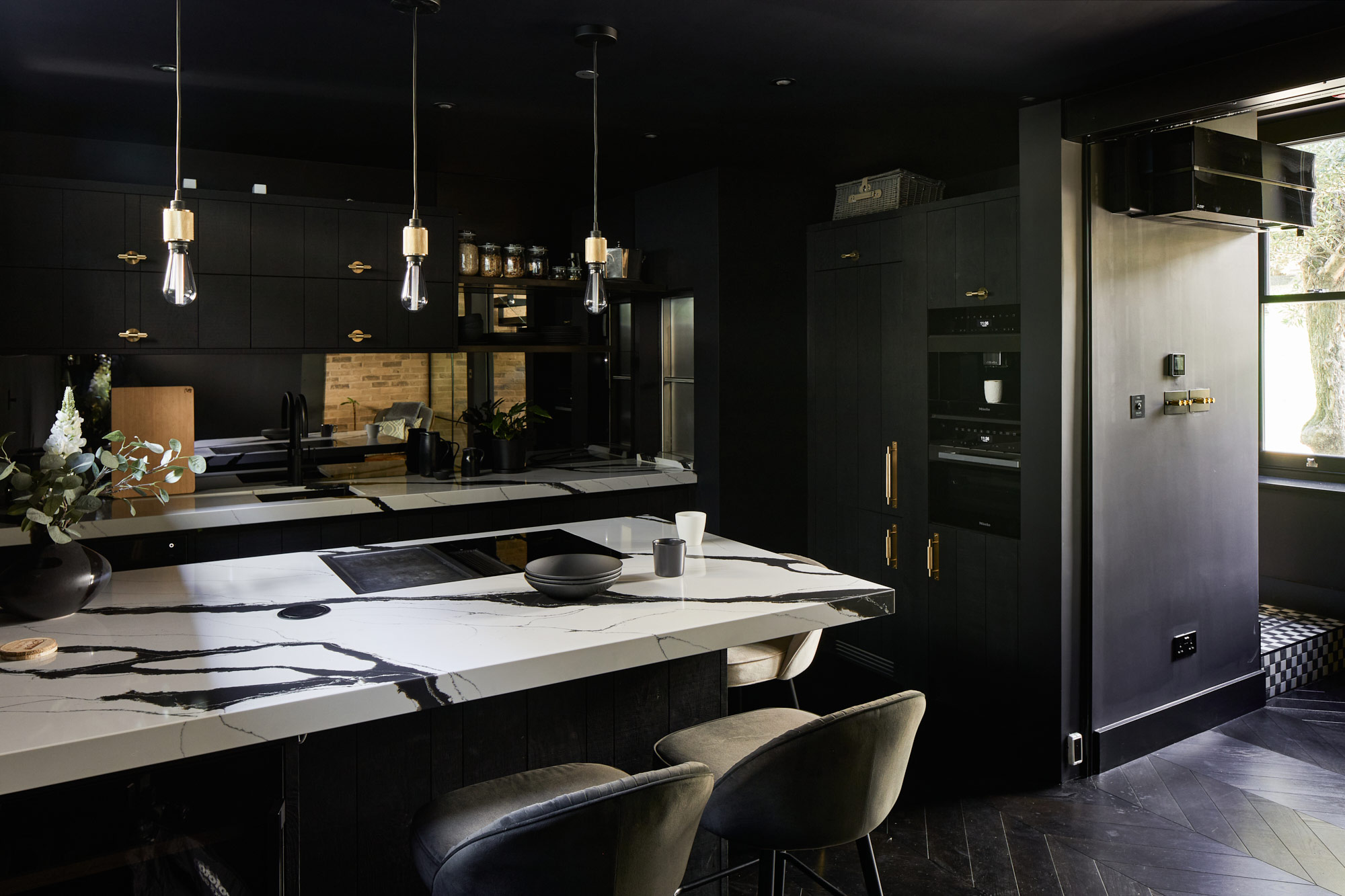 masculine kitchen with black oak cabinets
