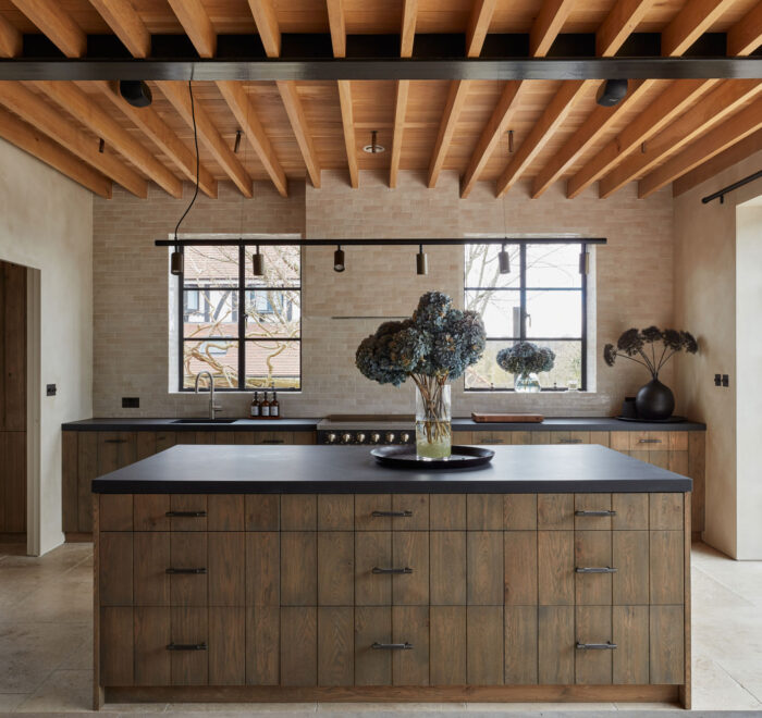 Minimal kitchen with wood cabinets