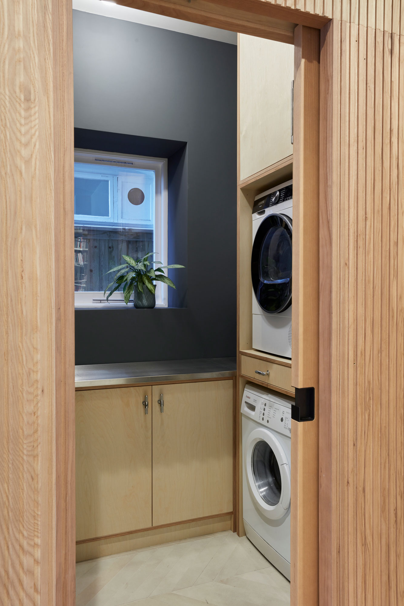 Integrated washer and dryer in bespoke utility room