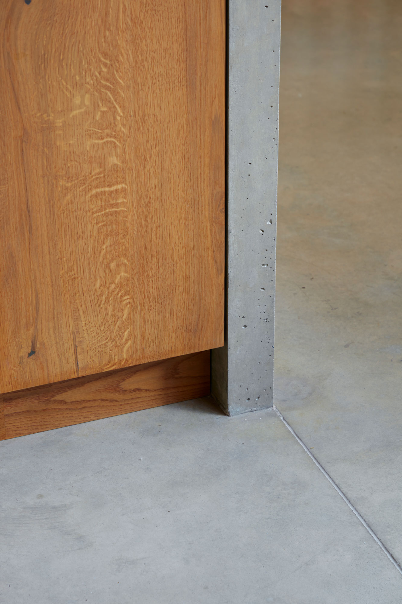 Concrete waterfall kitchen island