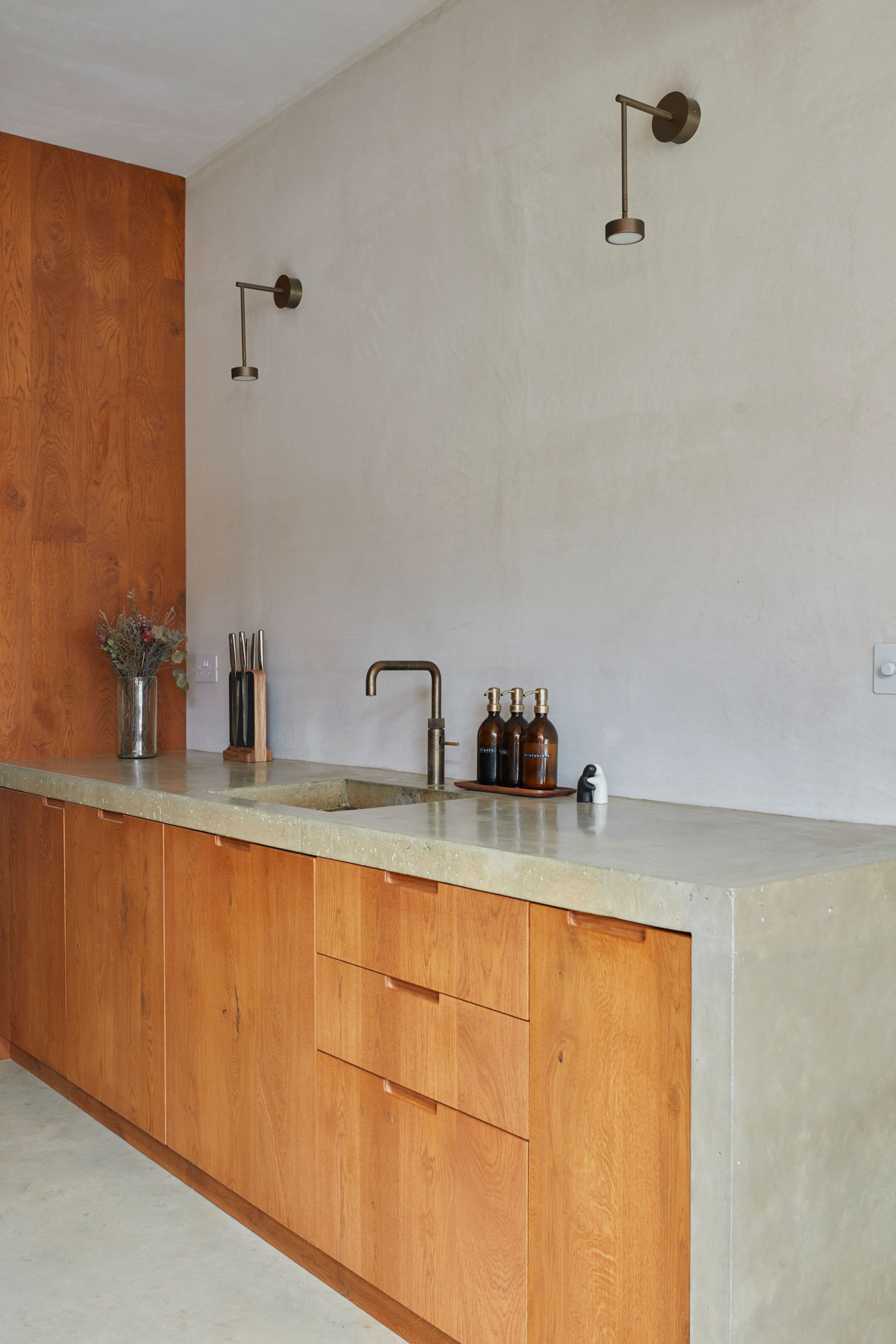 Oak kitchen with concrete worktops