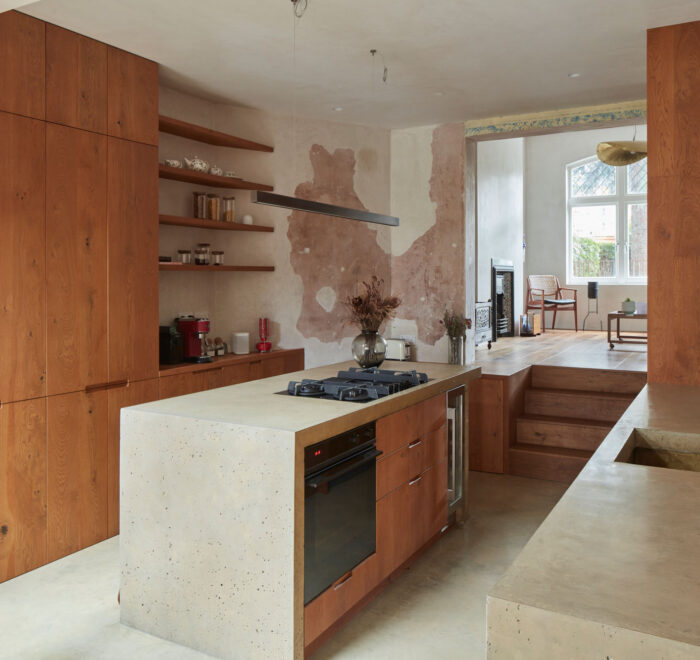 Open plan kitchen with concrete kitchen island