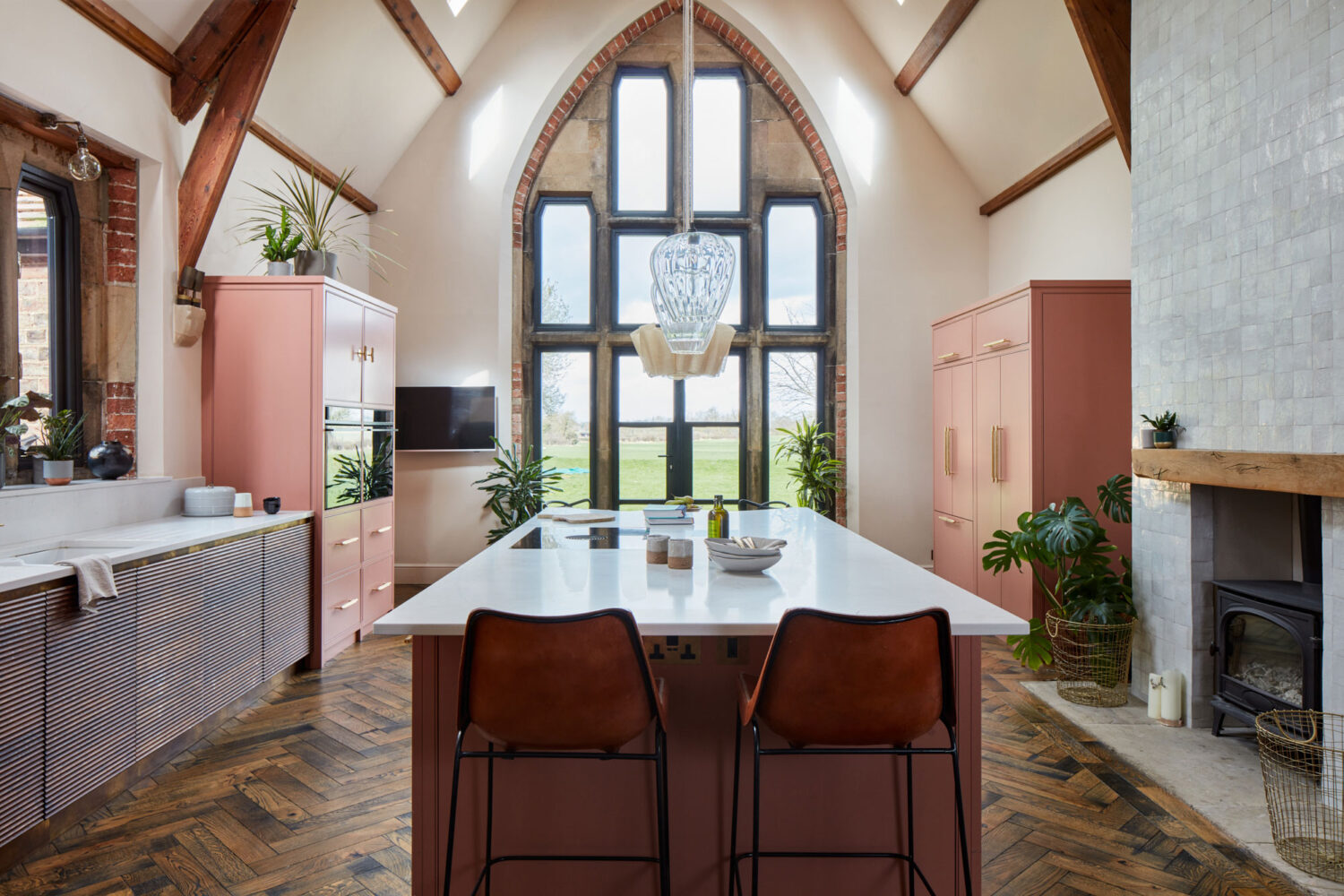 high ceiling room with an island kitchen