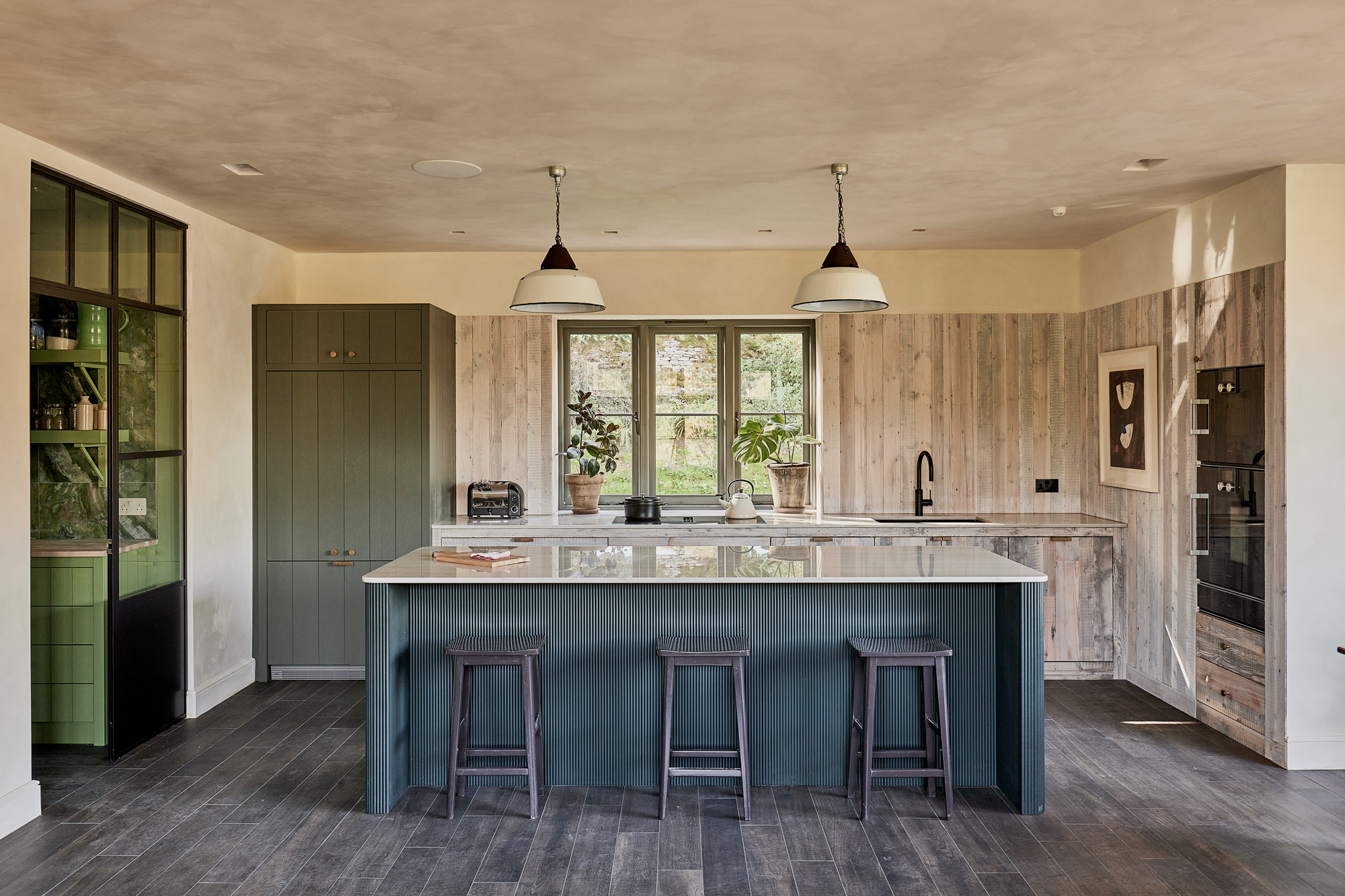 modern kitchen with reclaimed cladding