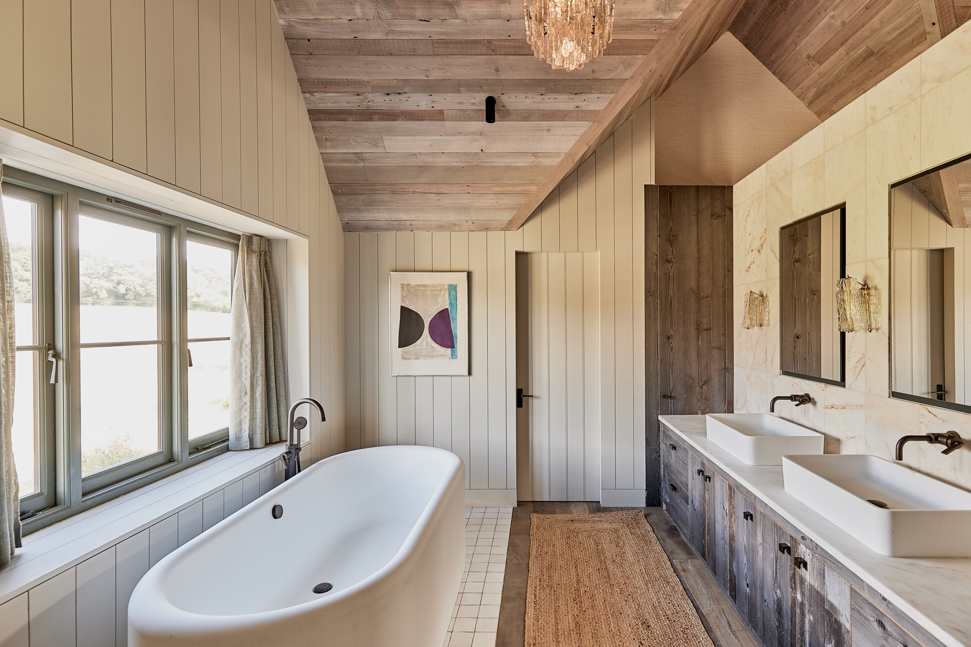 Bathroom styled with reclaimed wood cladding