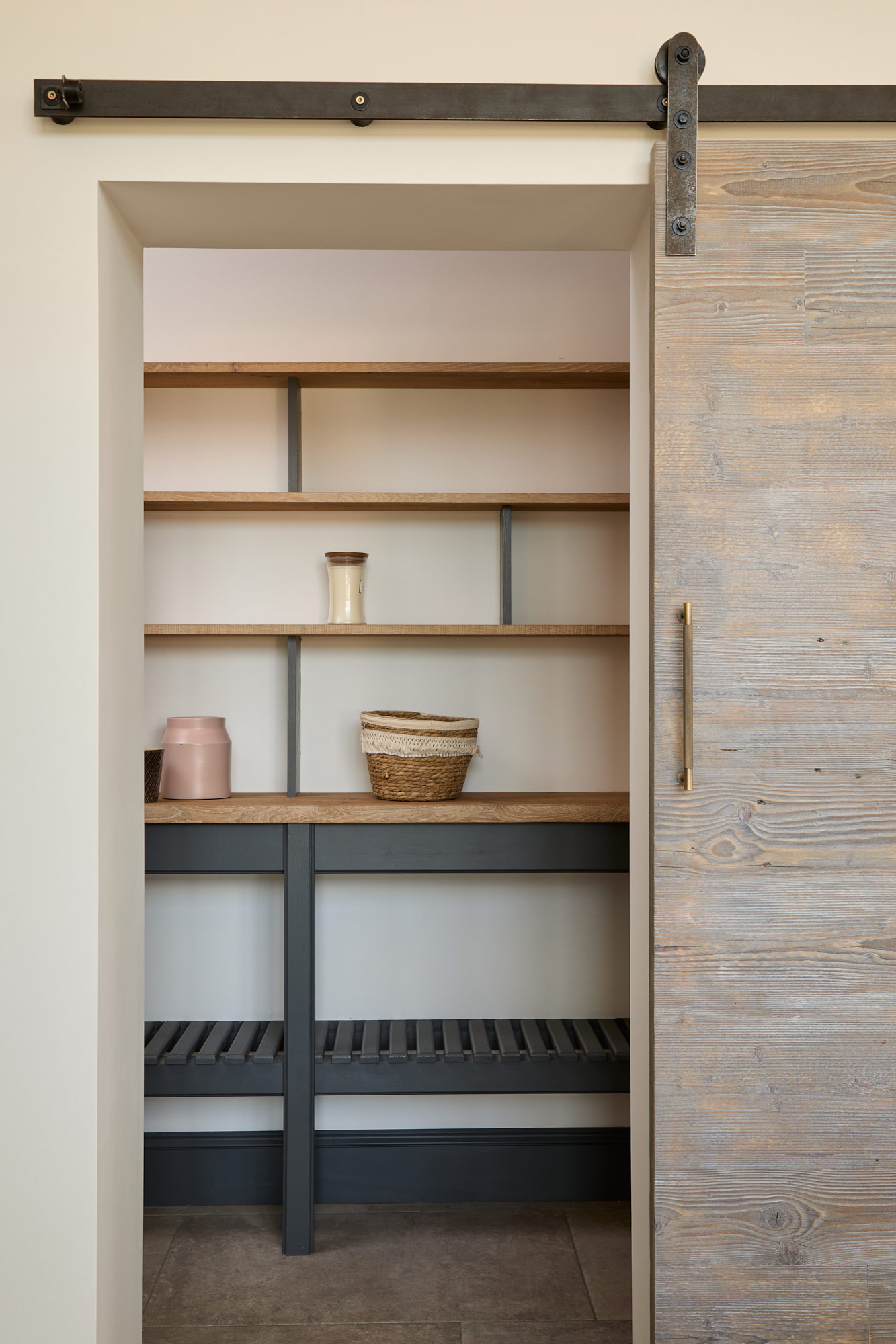 barn door slides in to open shelving