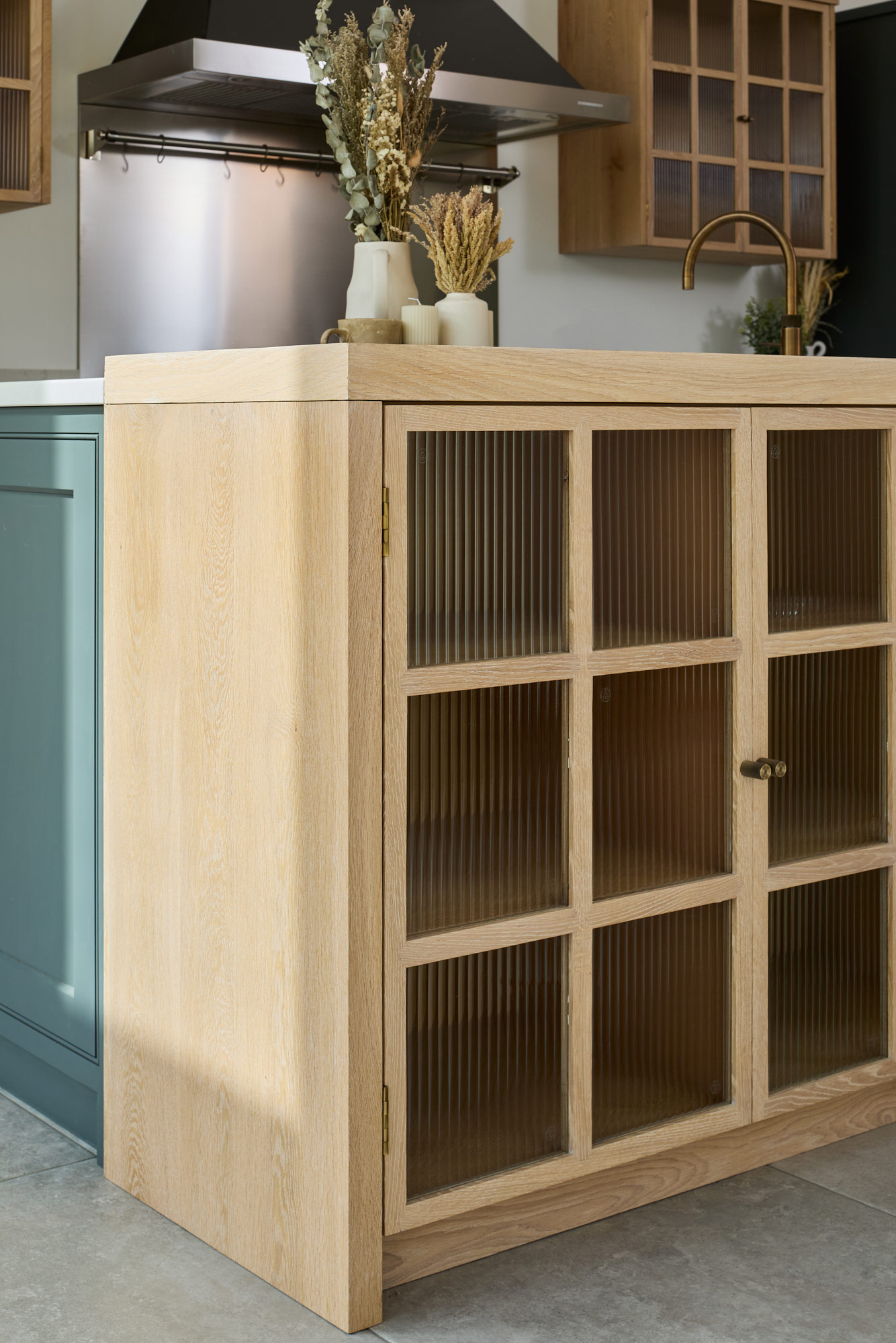 oak cabinet with fluted glass