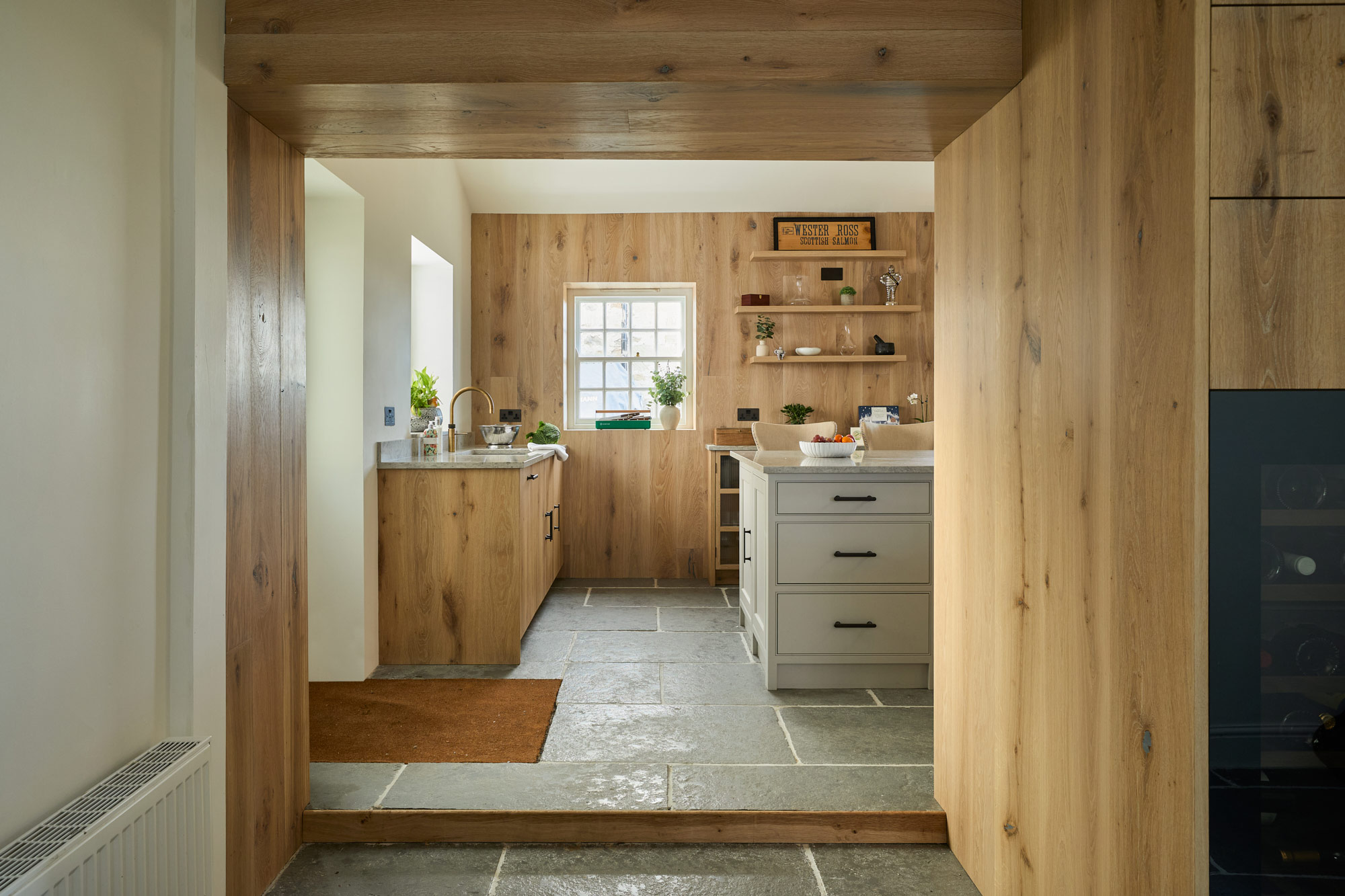 Oak cladded kitchen by The Main Company