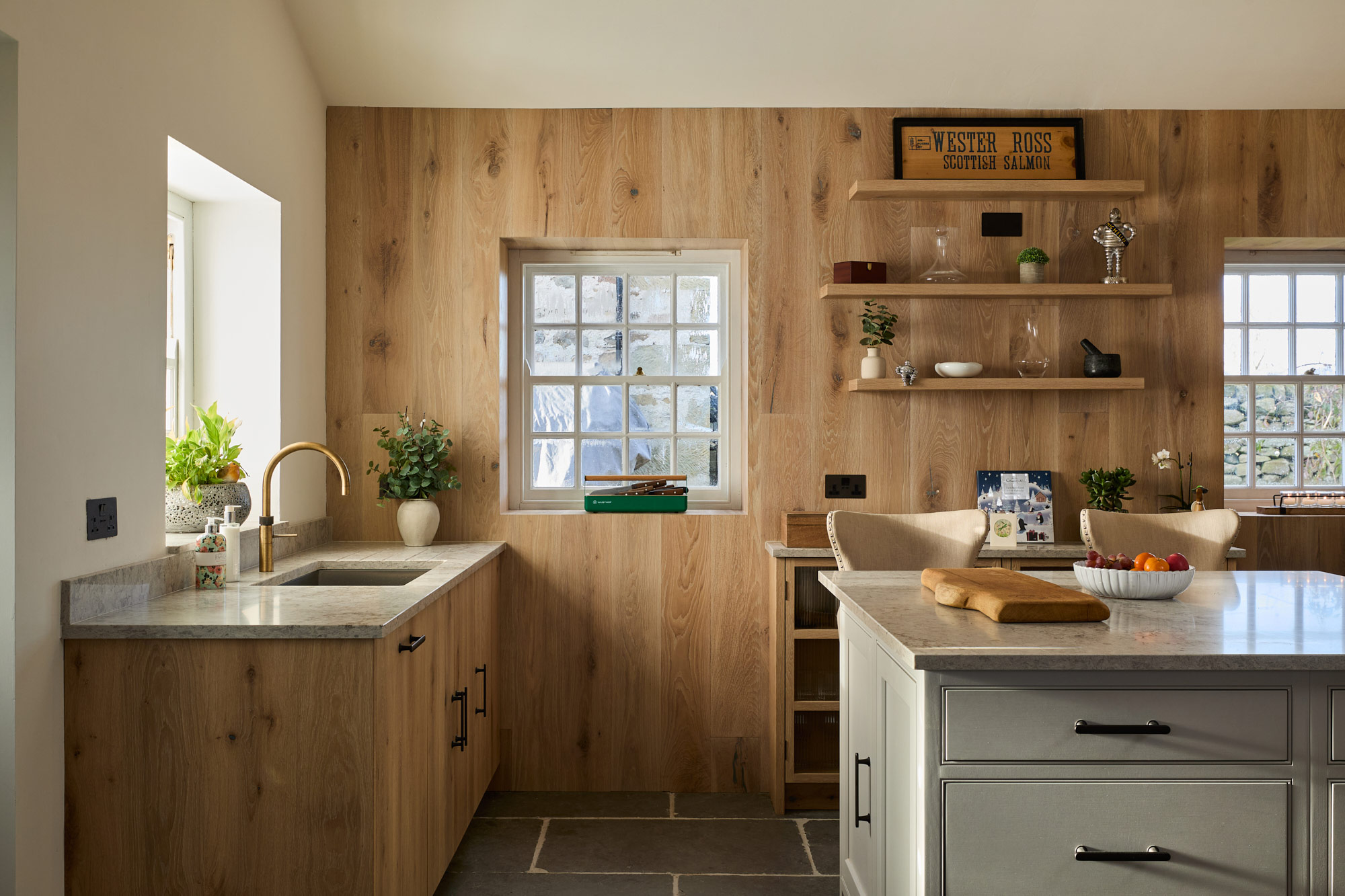 Oak cladded walls in a kitchen design